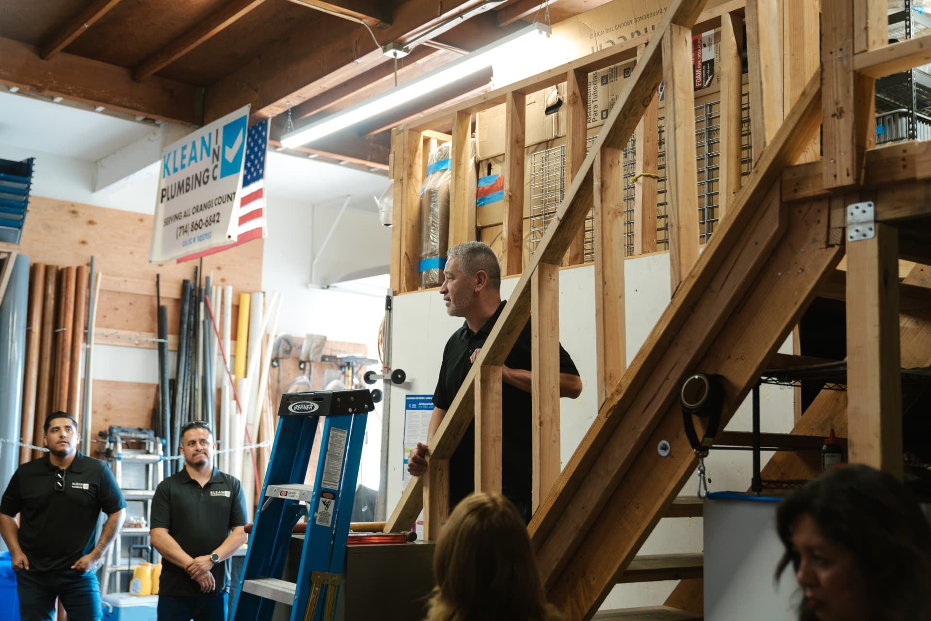 Joe addressing the Klean Plumbing team during a meeting at the shop